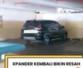 Mobil Xpander Plat H Bergoyang di Parkiran Basement Siang Hari
