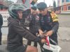 Sambut HUT RI ke-80, Brimob Ruteng Bagikan Bendera Merah Putih, Bangkitkan Semangat Nasionalisme